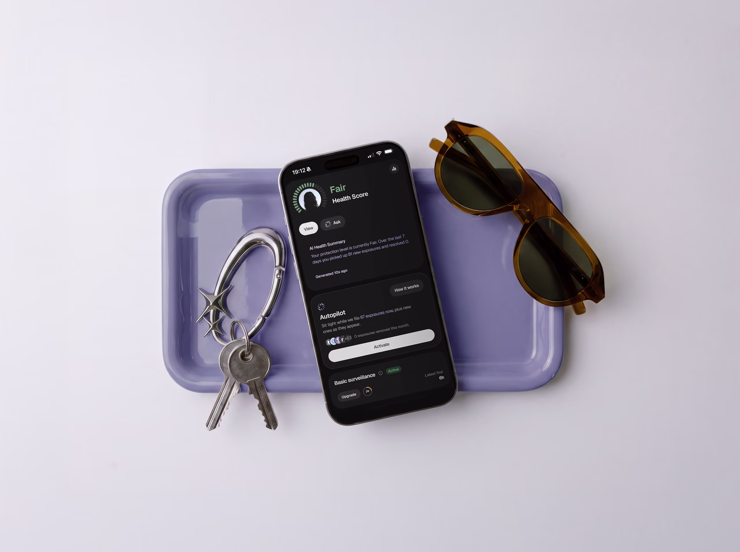 A phone running the Serus app resting on a sculpted white surface